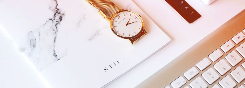 Close up photo of watch on a brochure